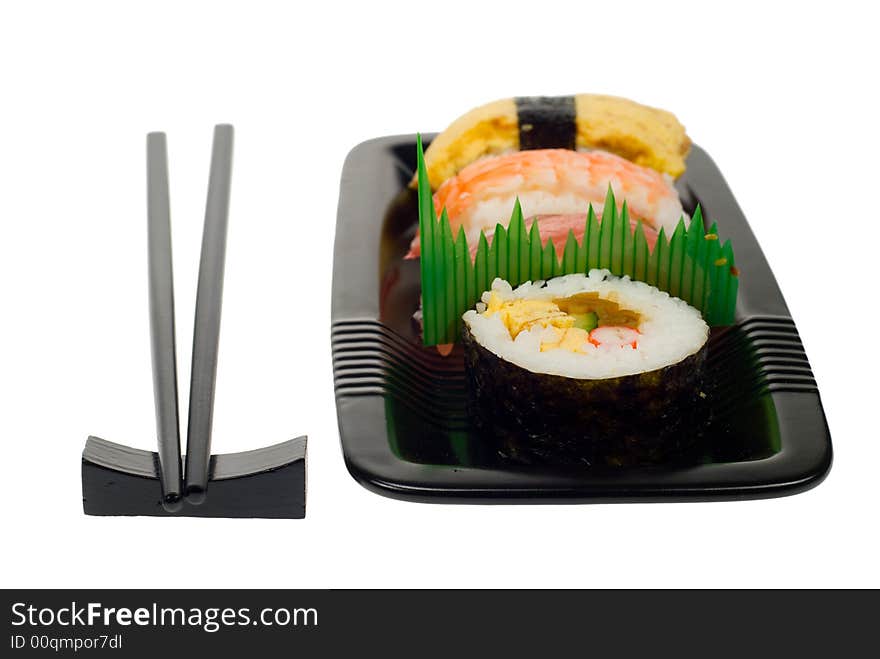 Assortment of sushi on a plate,  isolated on a white backgroud