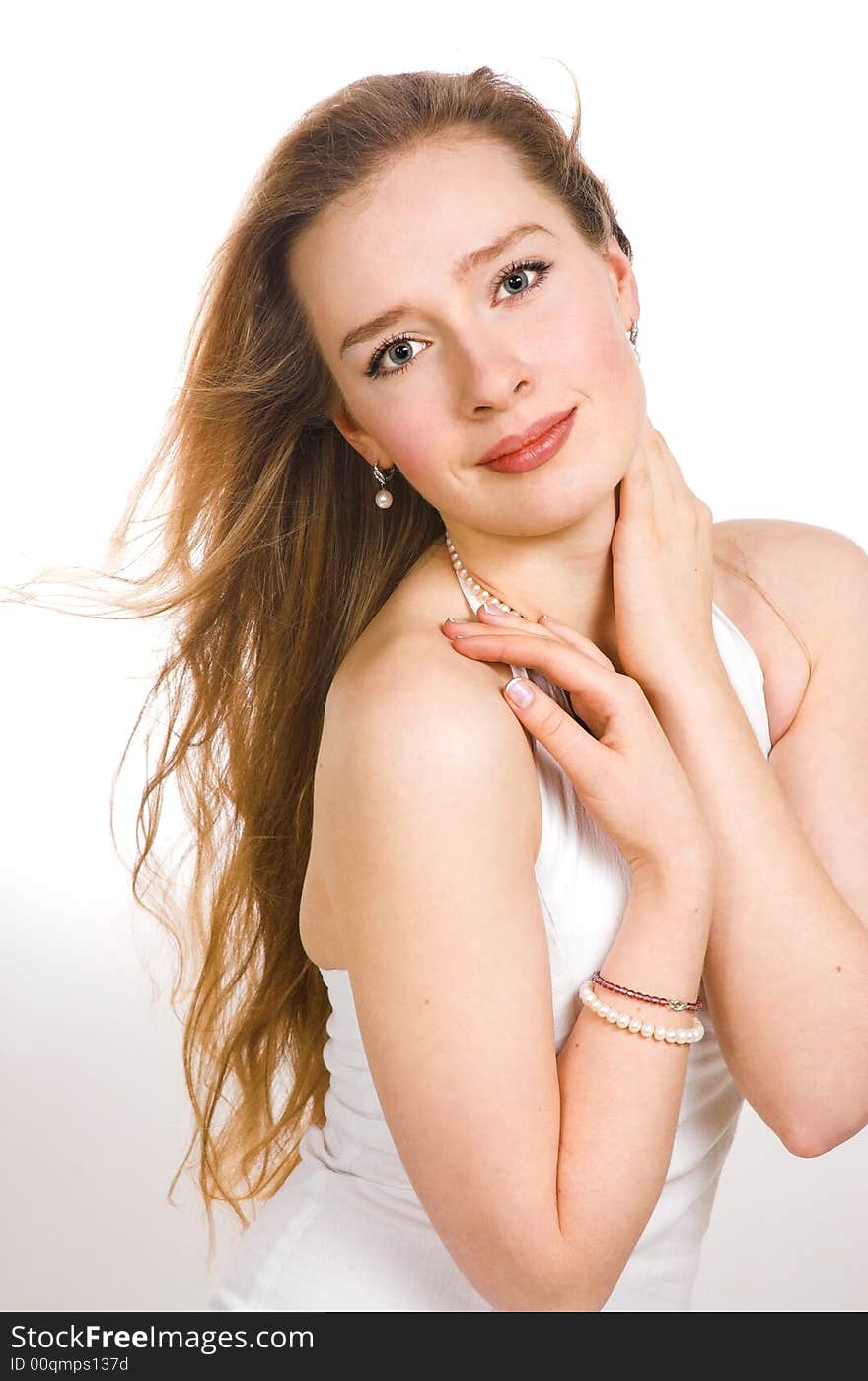 The beautiful blonde on a white background