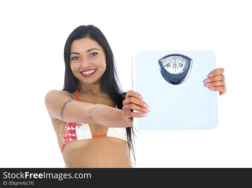 Beautiful girl with  scales on  isolated background