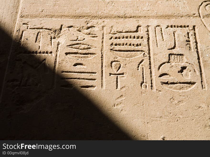 A photo of ancient egyptian script in Luxor, Egypt. A photo of ancient egyptian script in Luxor, Egypt