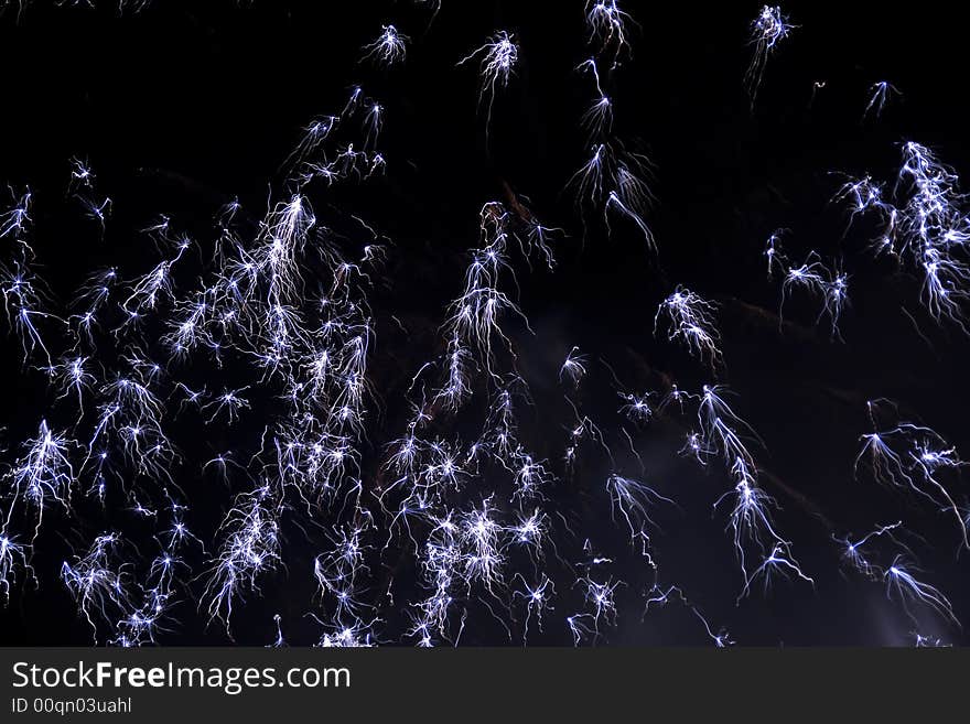 Black background with beautiful colored fireworks. Black background with beautiful colored fireworks