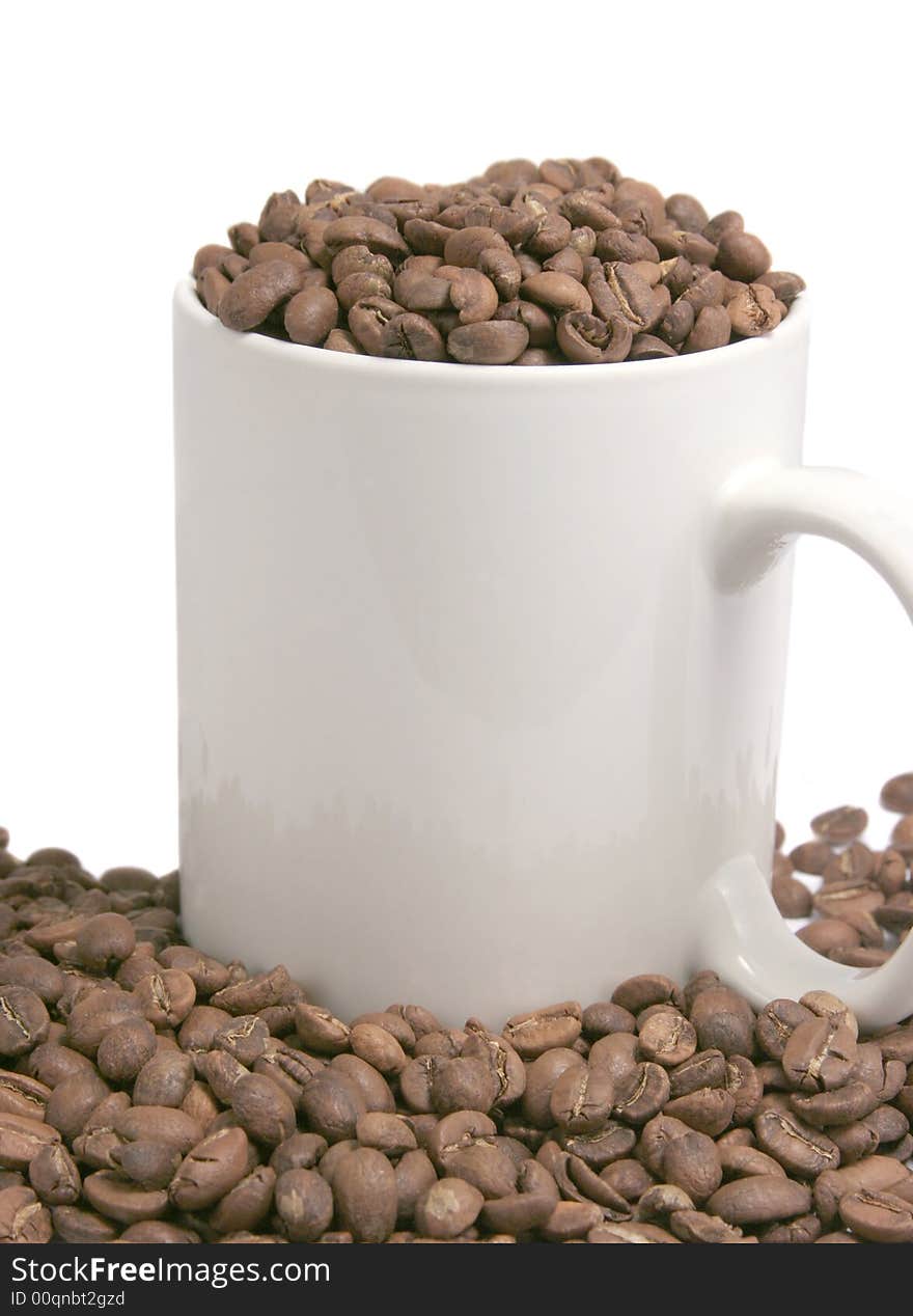 Beans of Coffee and Cup