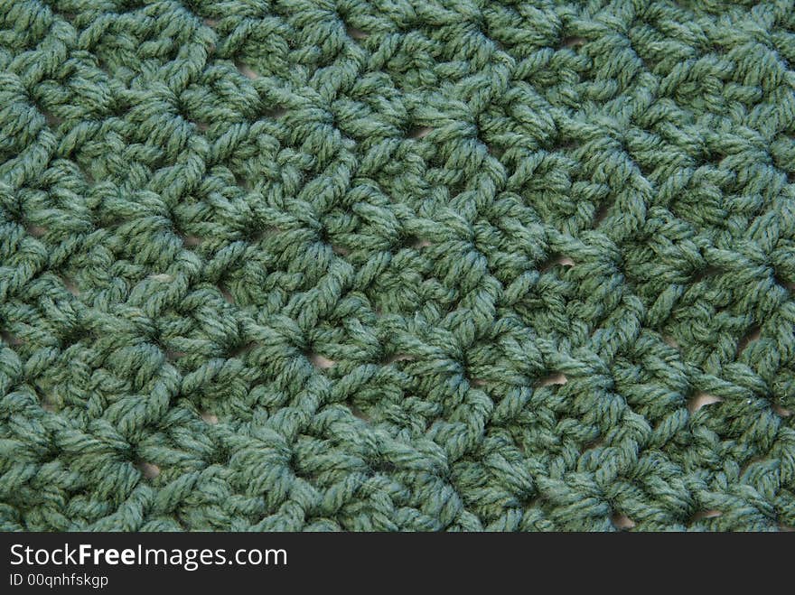 Close up of crochet pattern texture for use as background or design elements. Close up of crochet pattern texture for use as background or design elements.