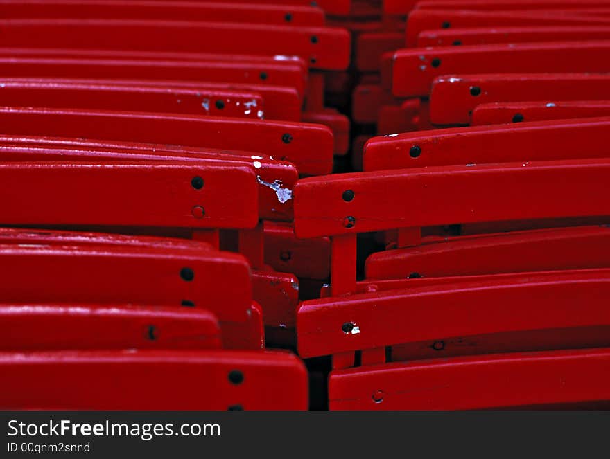 Red chairs outside a bar in europe