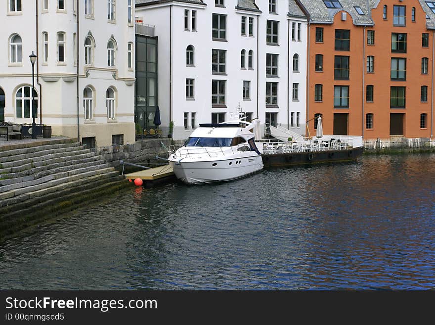 Alesund is a seaport, boat in the city