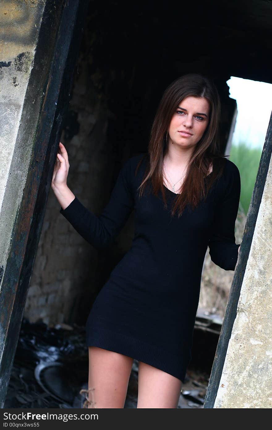 Young girl in the field on the warm winter day in the old ruin. Young girl in the field on the warm winter day in the old ruin