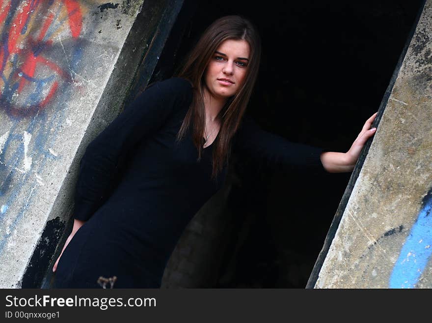 Young girl in the field on the warm winter day in the old ruin. Young girl in the field on the warm winter day in the old ruin