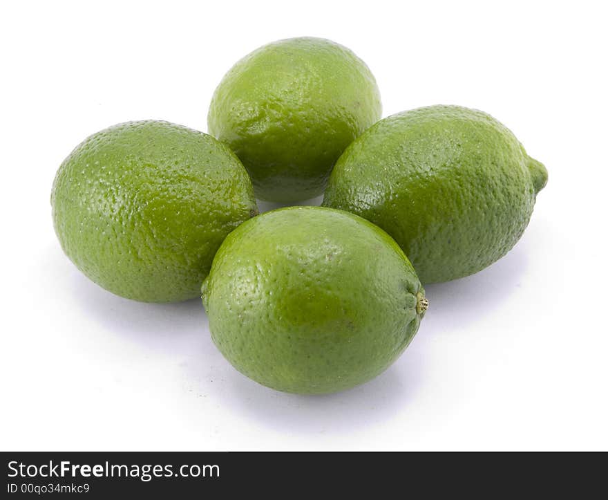 Group of Whole Limes with Halved Lime Isolated on White Background.