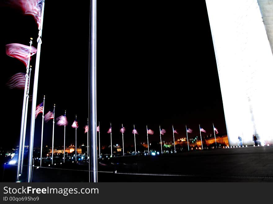 Flags around the Washington Monument in Washington DC  waving in the wind. Flags around the Washington Monument in Washington DC  waving in the wind.