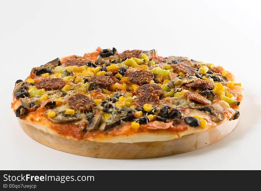 Isolated homemade pizza on white background.