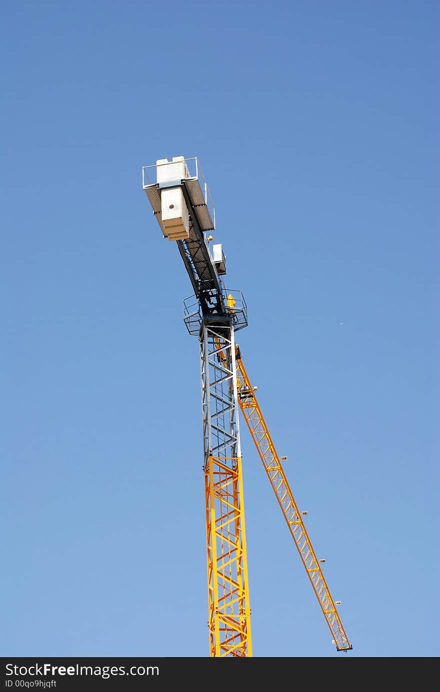 The tower crane under the sky