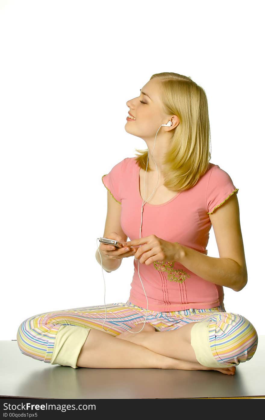 Portrait of the beautiful blonde in studio