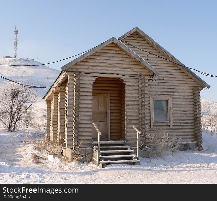 Russian wooden small house in the winter. Russian wooden small house in the winter