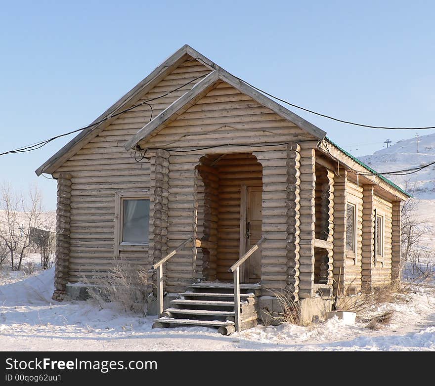 Russian wooden small house in the winter. Russian wooden small house in the winter