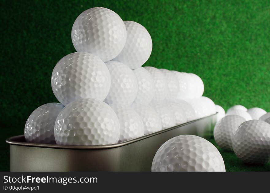 Golfballs waiting for a very long ride