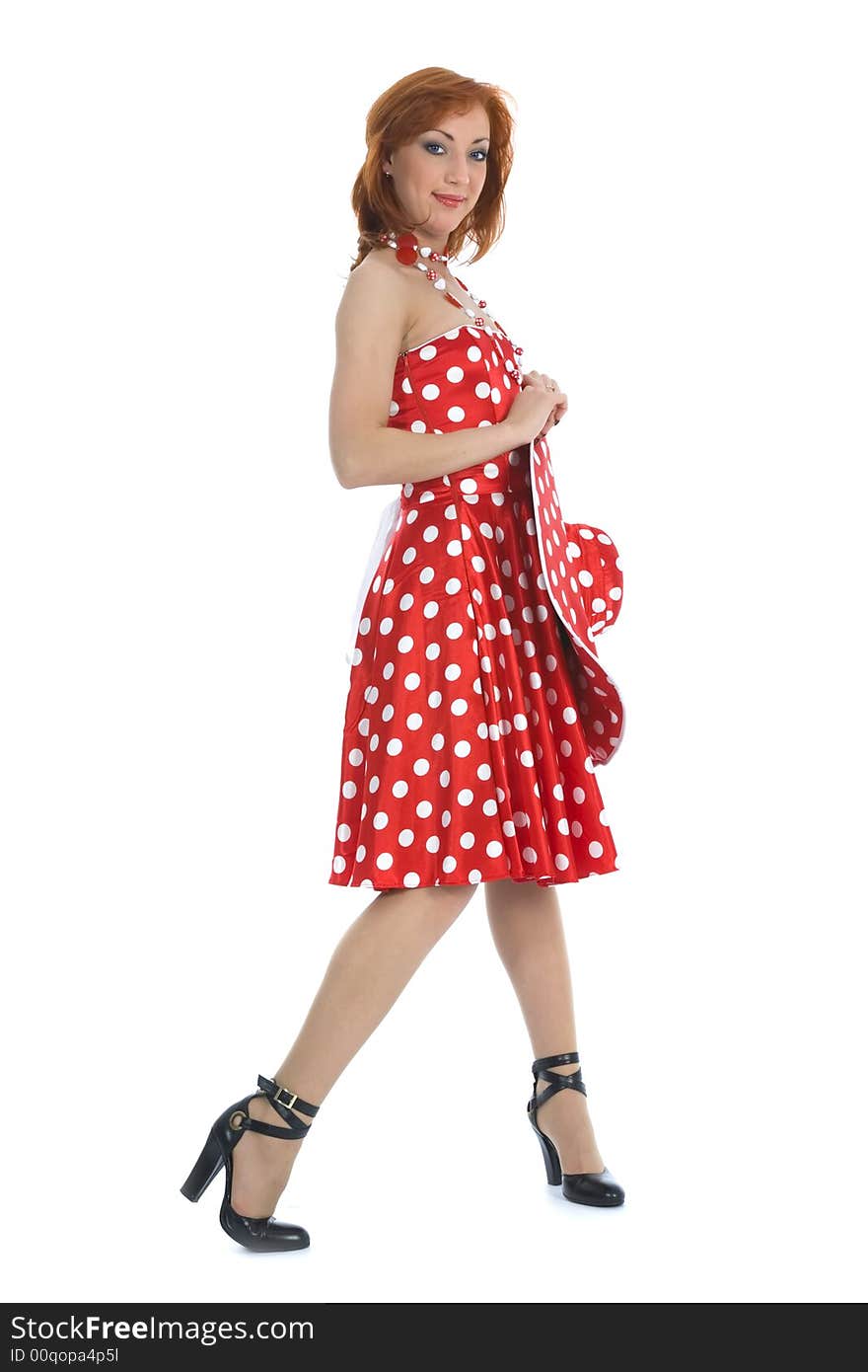 Portrait redheaded with spotted dress on white background