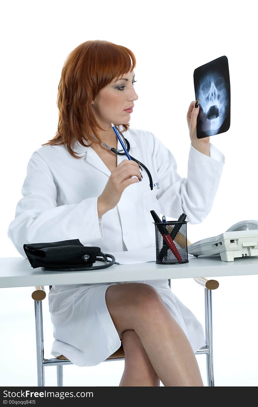 Young doctor with stethoscope on isolated background