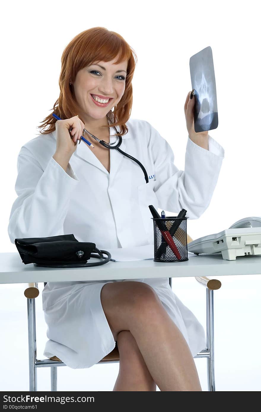 Young doctor with stethoscope on isolated background