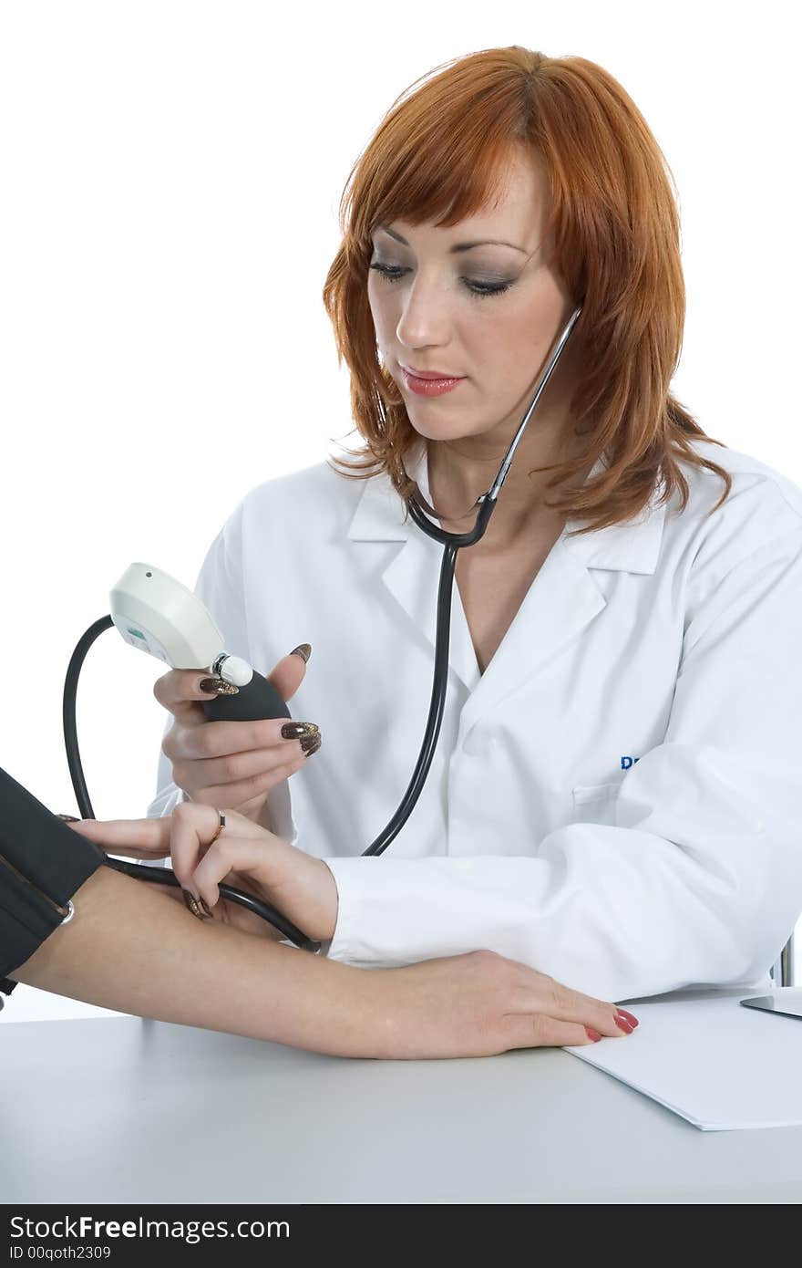 Young doctor with stethoscope on isolated background