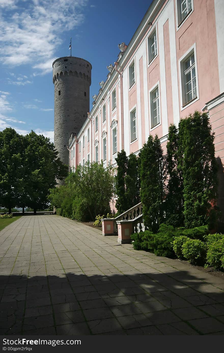 Parliament of Estonia and Pikk Hermann bastion from the Garden of Governor, in Tallin, Estonia, Europe. Parliament of Estonia and Pikk Hermann bastion from the Garden of Governor, in Tallin, Estonia, Europe