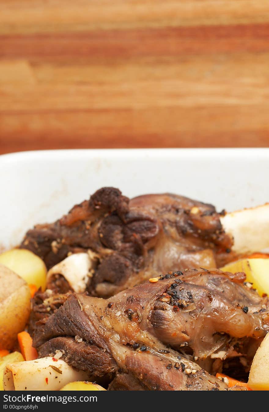 Lamb shanks cooked with potatoes