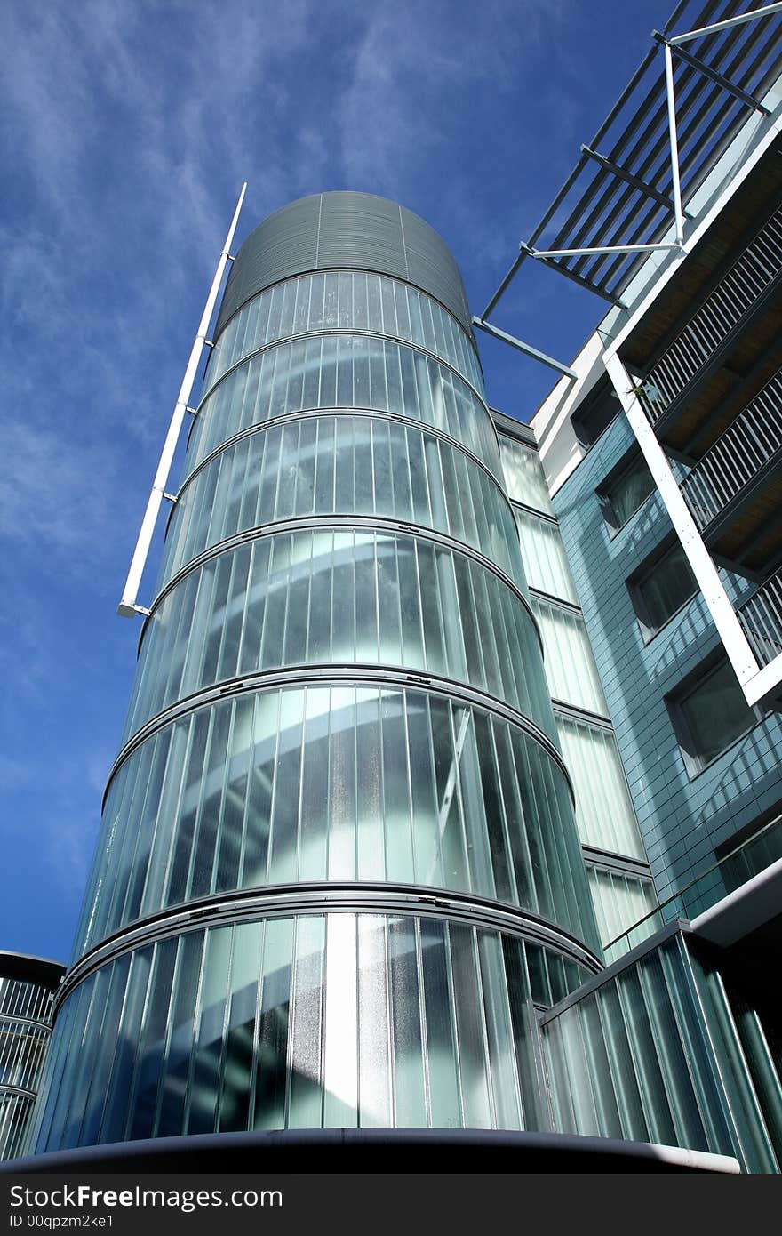 Modern Urban Shopping and Commercial area in an English Town against a blue winter sky. Modern Urban Shopping and Commercial area in an English Town against a blue winter sky