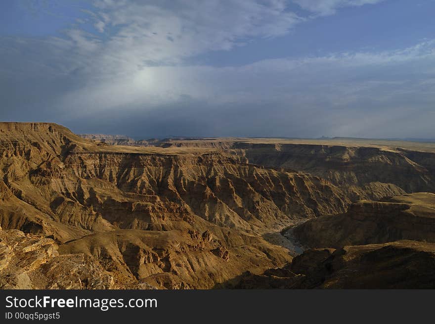 Great view over the Fish River Canyon. The Fish river canyon ist the largest canyon in Africa. In total about 160 km long, up to 27 km wide and in places almost 550 metres deep (Namibia)