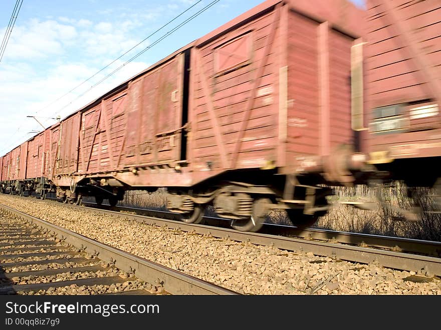 Fast moving cargo train with stock in Europe. Fast moving cargo train with stock in Europe