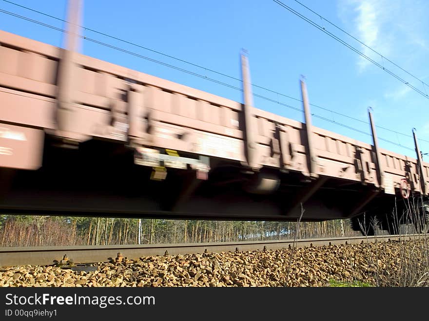 Fast moving cargo train with stock in Europe. Fast moving cargo train with stock in Europe