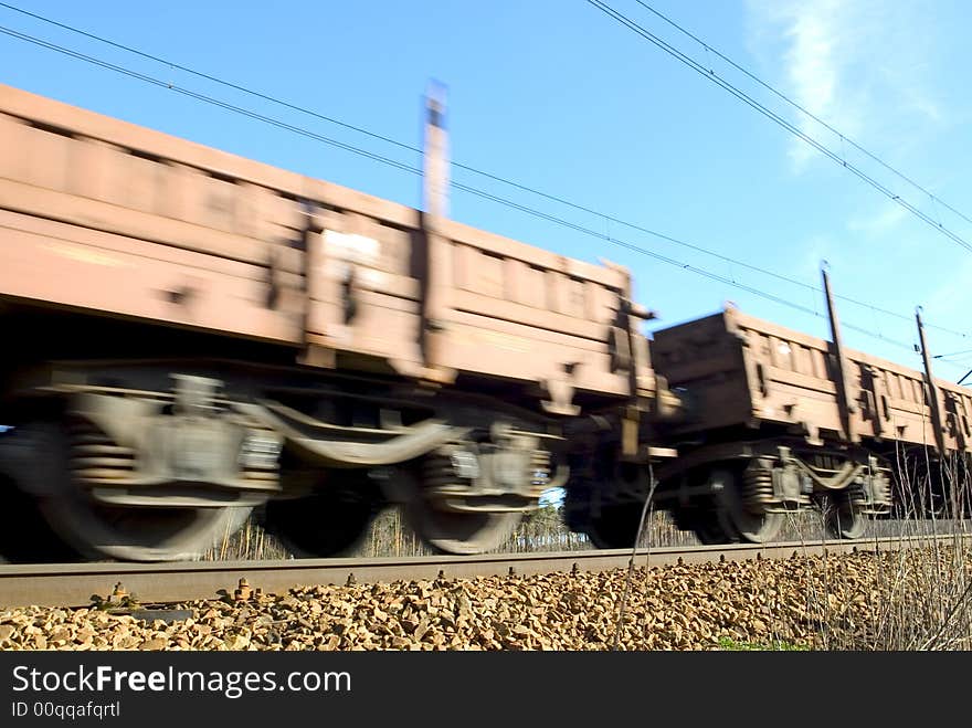 Fast moving cargo train with stock in Europe. Fast moving cargo train with stock in Europe