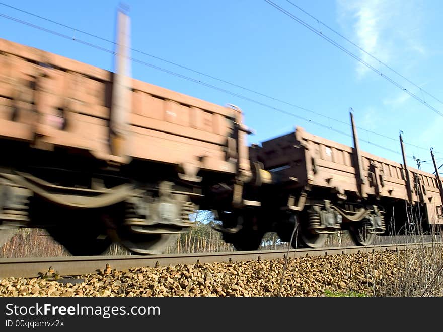 Fast moving cargo train with stock in Europe. Fast moving cargo train with stock in Europe