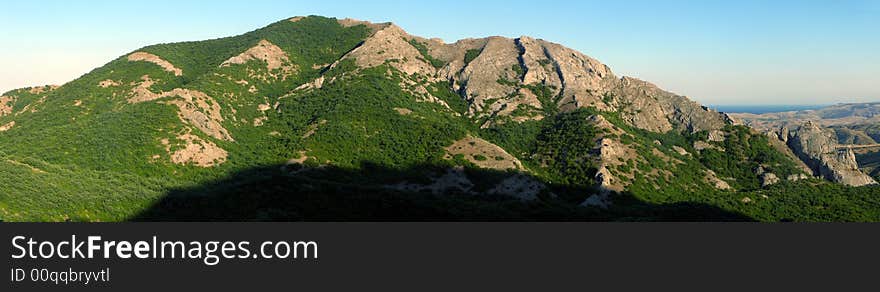 Panoramic Image of the Hill Covered by Green Forest. Panoramic Image of the Hill Covered by Green Forest