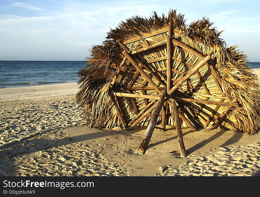 Cabana stuck in sand on beach. Cabana stuck in sand on beach