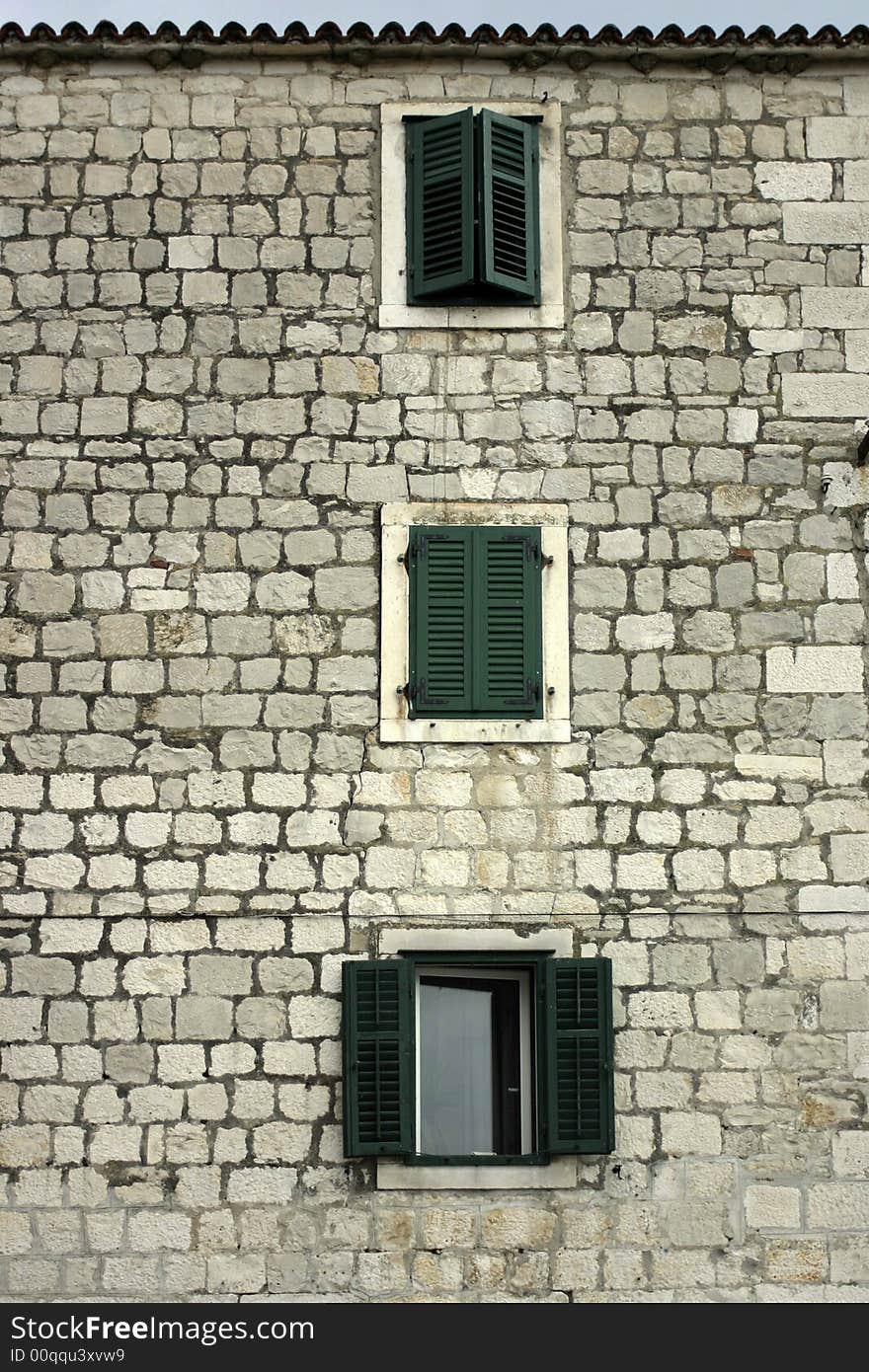 Windows in old stone wall. Windows in old stone wall.