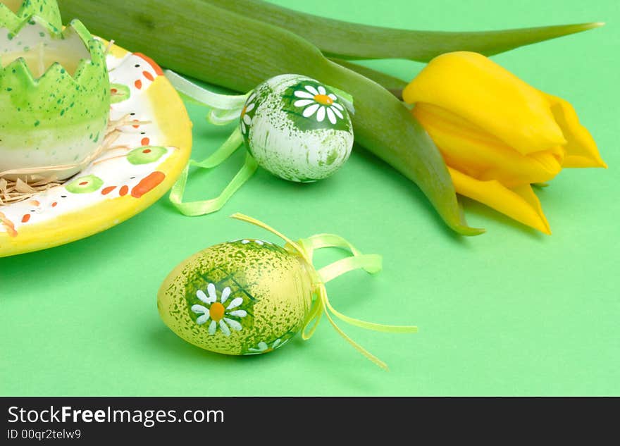 Easter eggs, candle  and tulip. Easter eggs, candle  and tulip