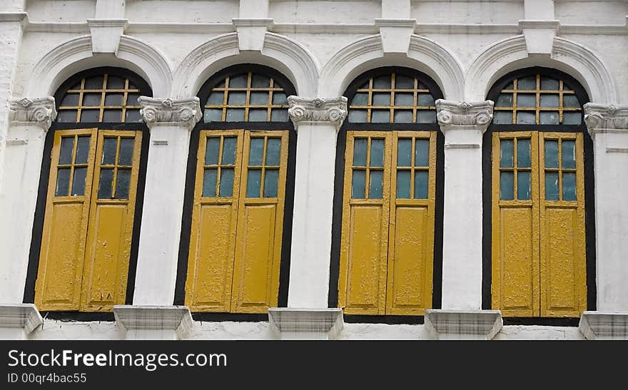 Windows of old colonial building. Windows of old colonial building