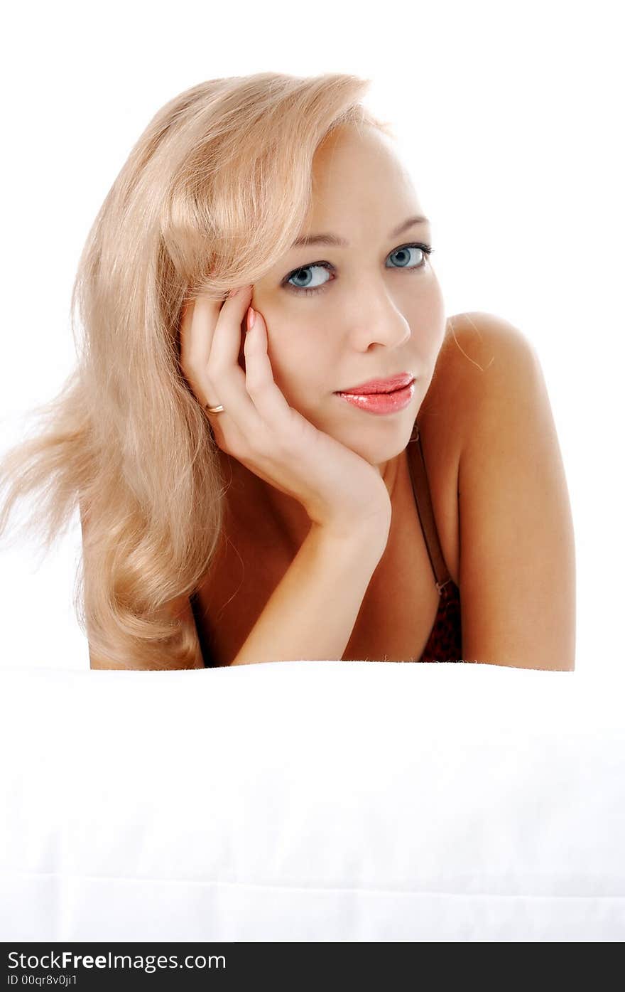 Young woman lie in white bed. Young woman lie in white bed