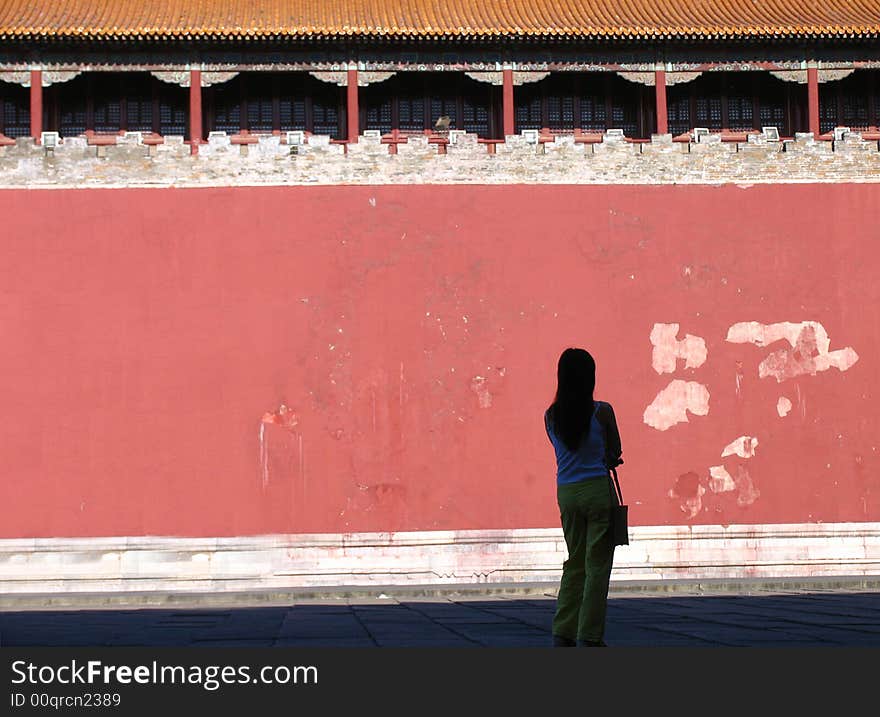 A woman Facing at the ancient castle. A woman Facing at the ancient castle