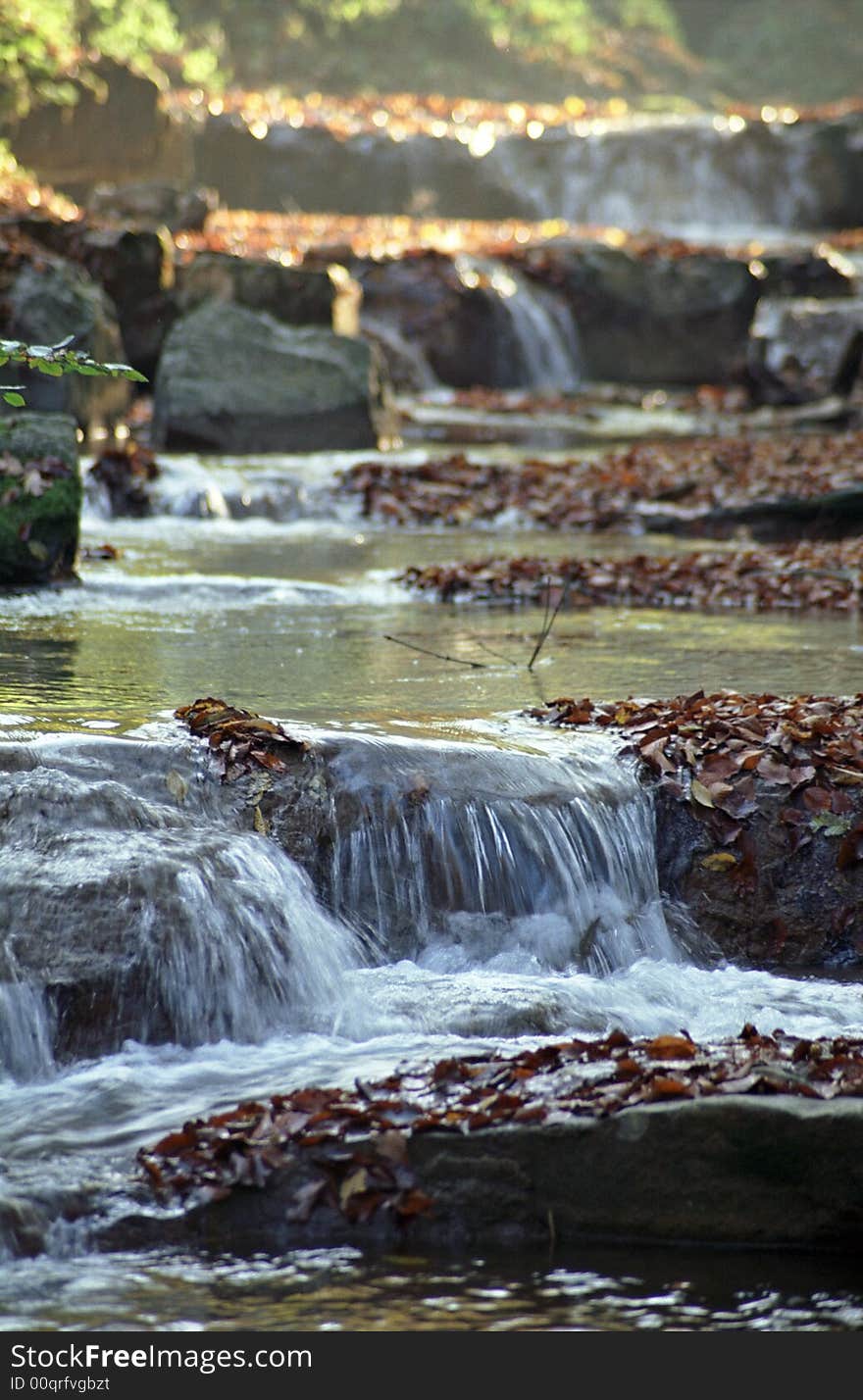 Beautiful autumn waterfall in the forst