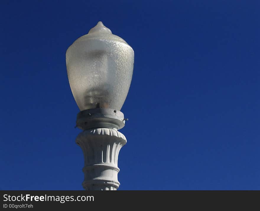 Lamp against a blue sky