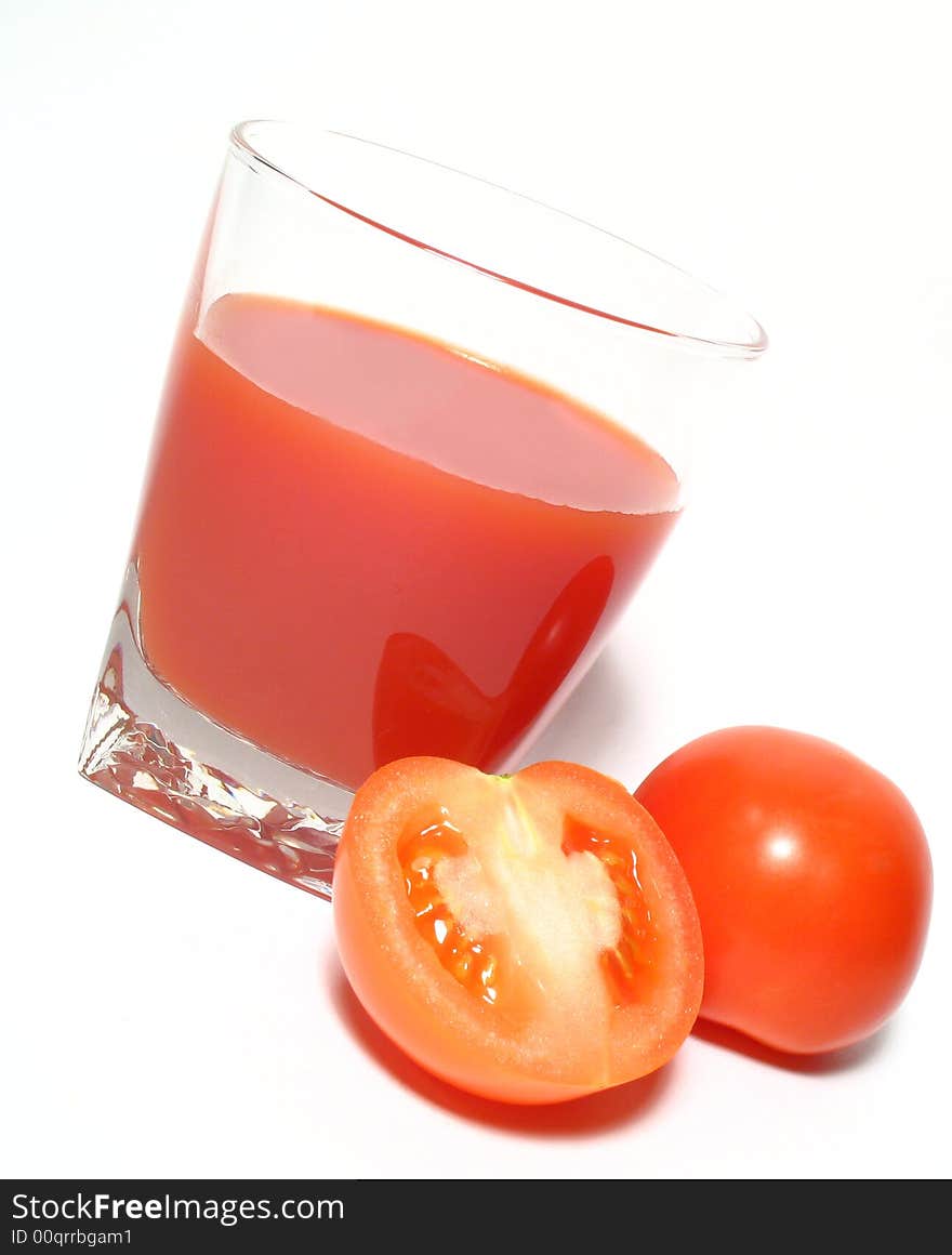 Still life with tomatos juice and tomatos