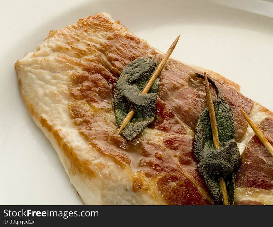 Italian calf cutlet with ham and sage leaves. Italian calf cutlet with ham and sage leaves