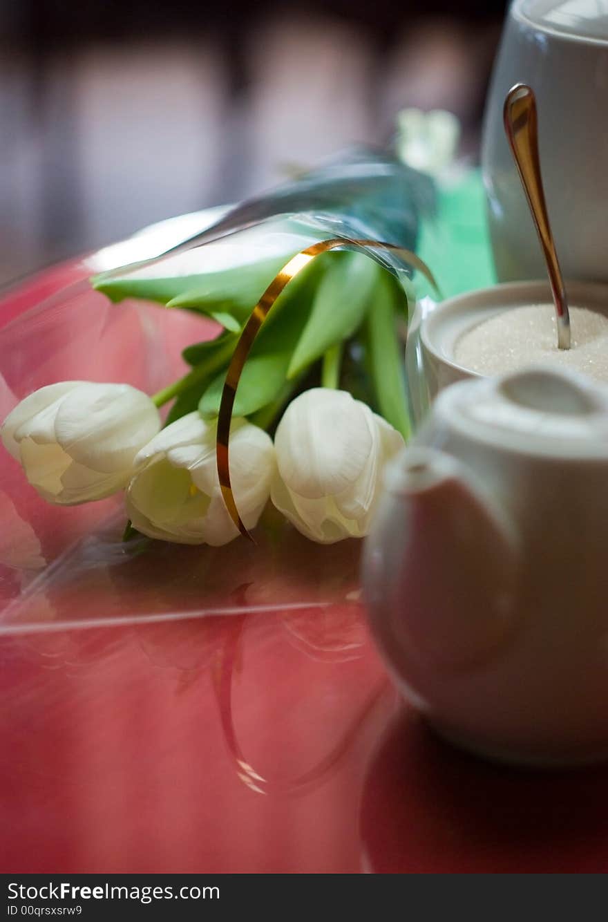 White tulips on a coffee table. White tulips on a coffee table