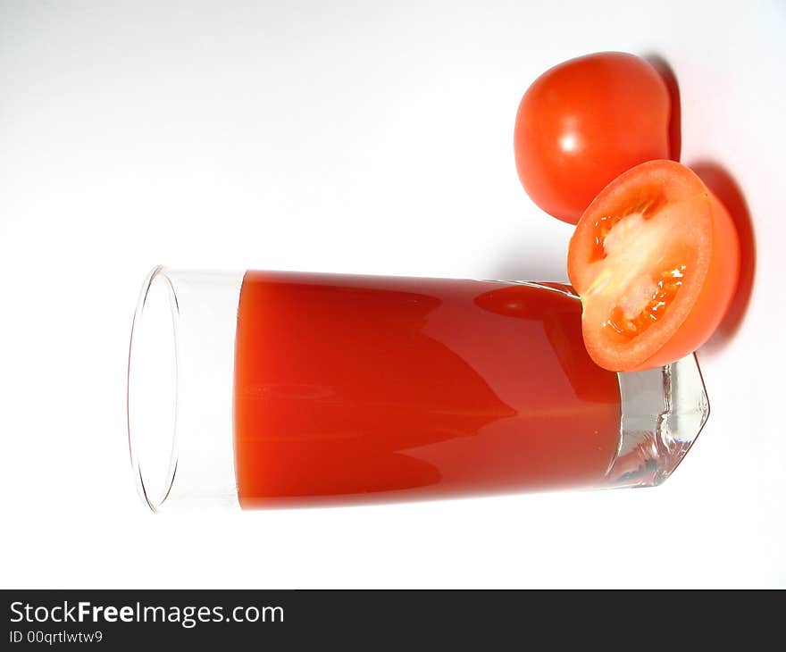 Still life with tomatos juice and tomatos