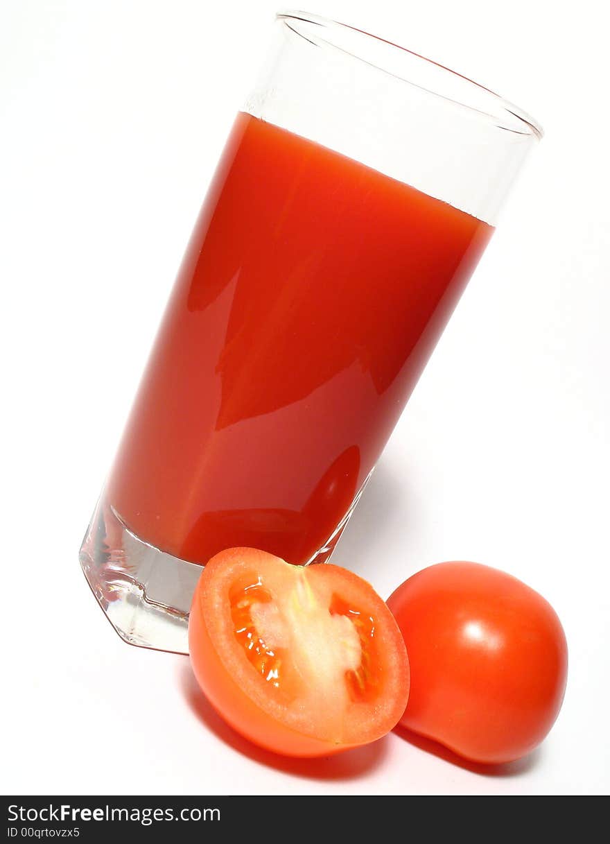 Still life with tomatos juice and tomatos