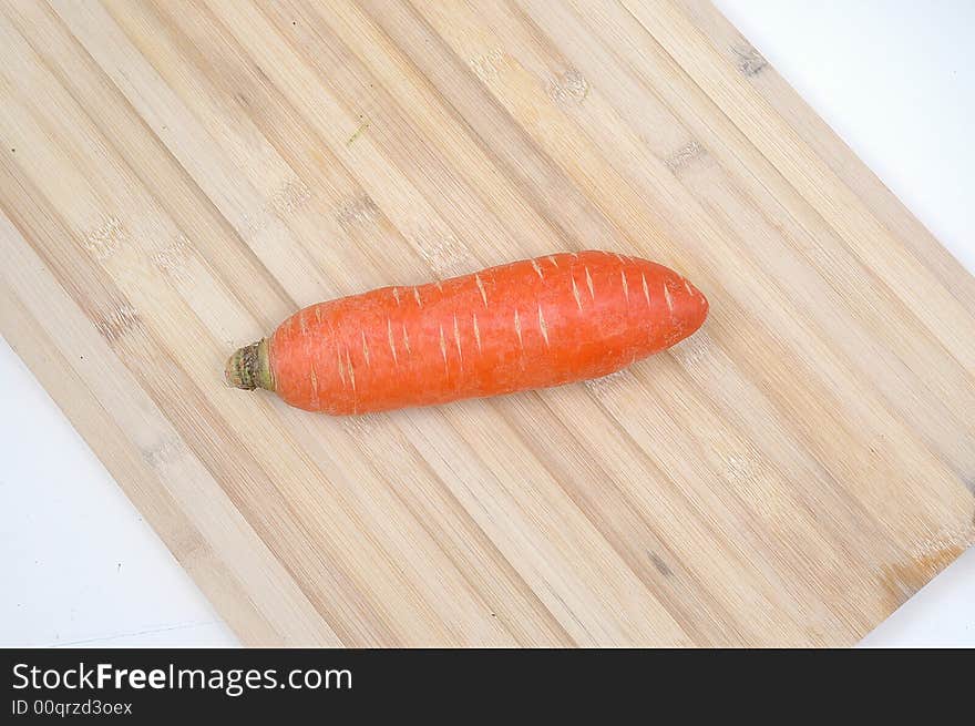 The usually tapering, elongate, fleshy orange root of this plant, eaten as a vegetable. The usually tapering, elongate, fleshy orange root of this plant, eaten as a vegetable.