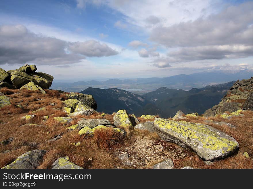 Autumn mountain landscape with clouds on the sky. Autumn mountain landscape with clouds on the sky