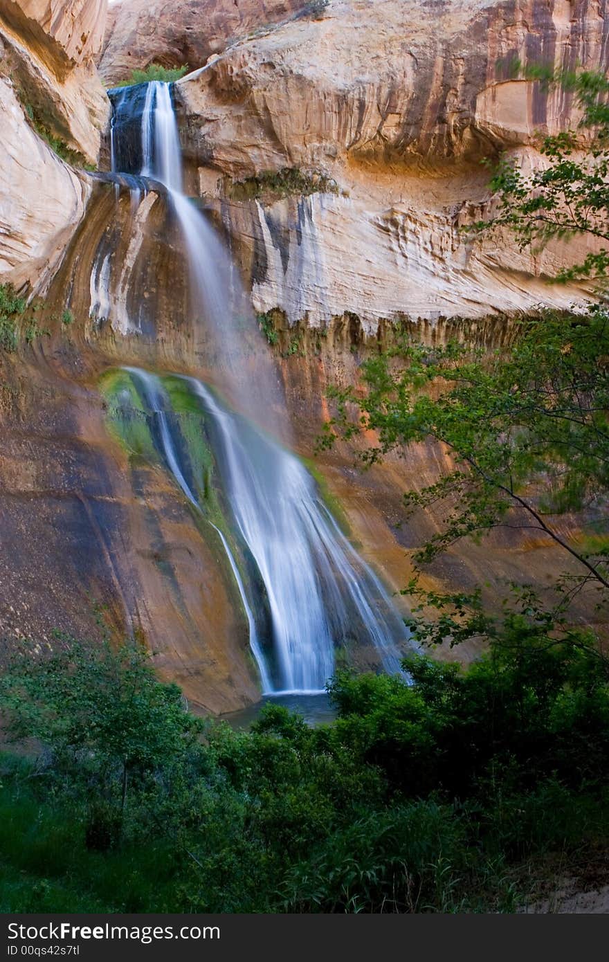 Waterfall Against Red Rock