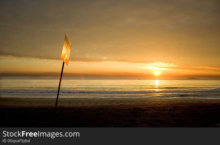 Black sea-Bulgaria-2008 It starts the new day. The sun punctures a road for itself in its oort clouds.Sunrise above the sea. Black sea-Bulgaria-2008 It starts the new day. The sun punctures a road for itself in its oort clouds.Sunrise above the sea