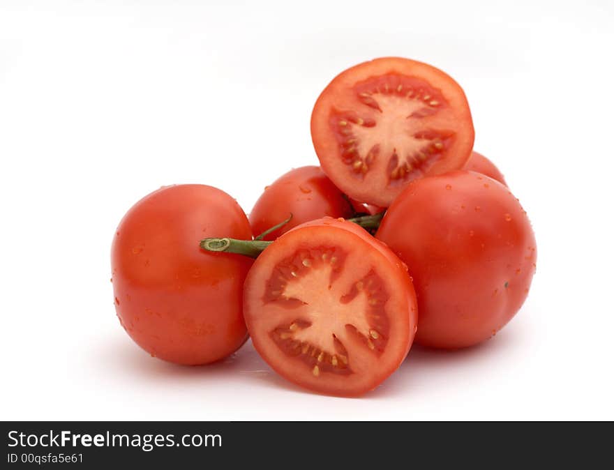 Red tomatoes on a white background